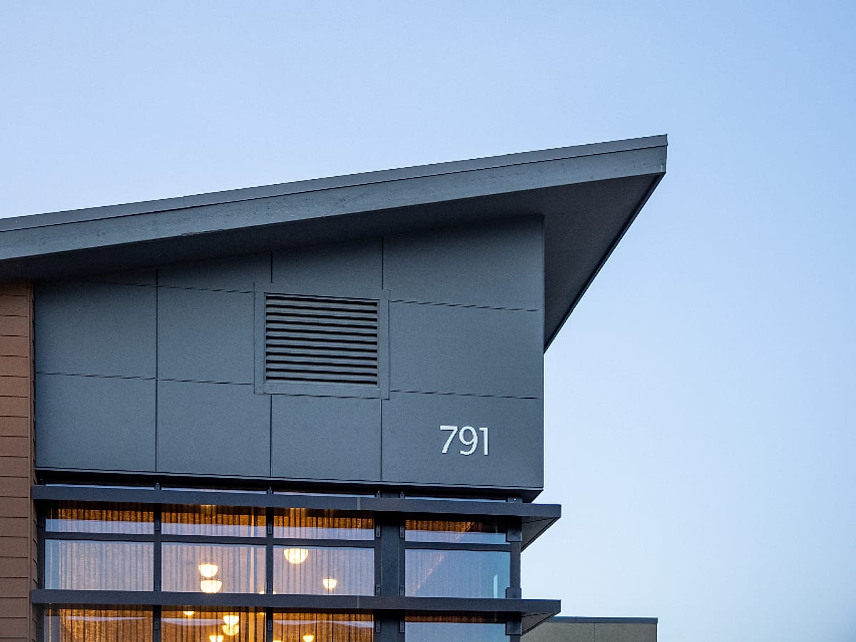 A clean roofline at dusk — representative imagery